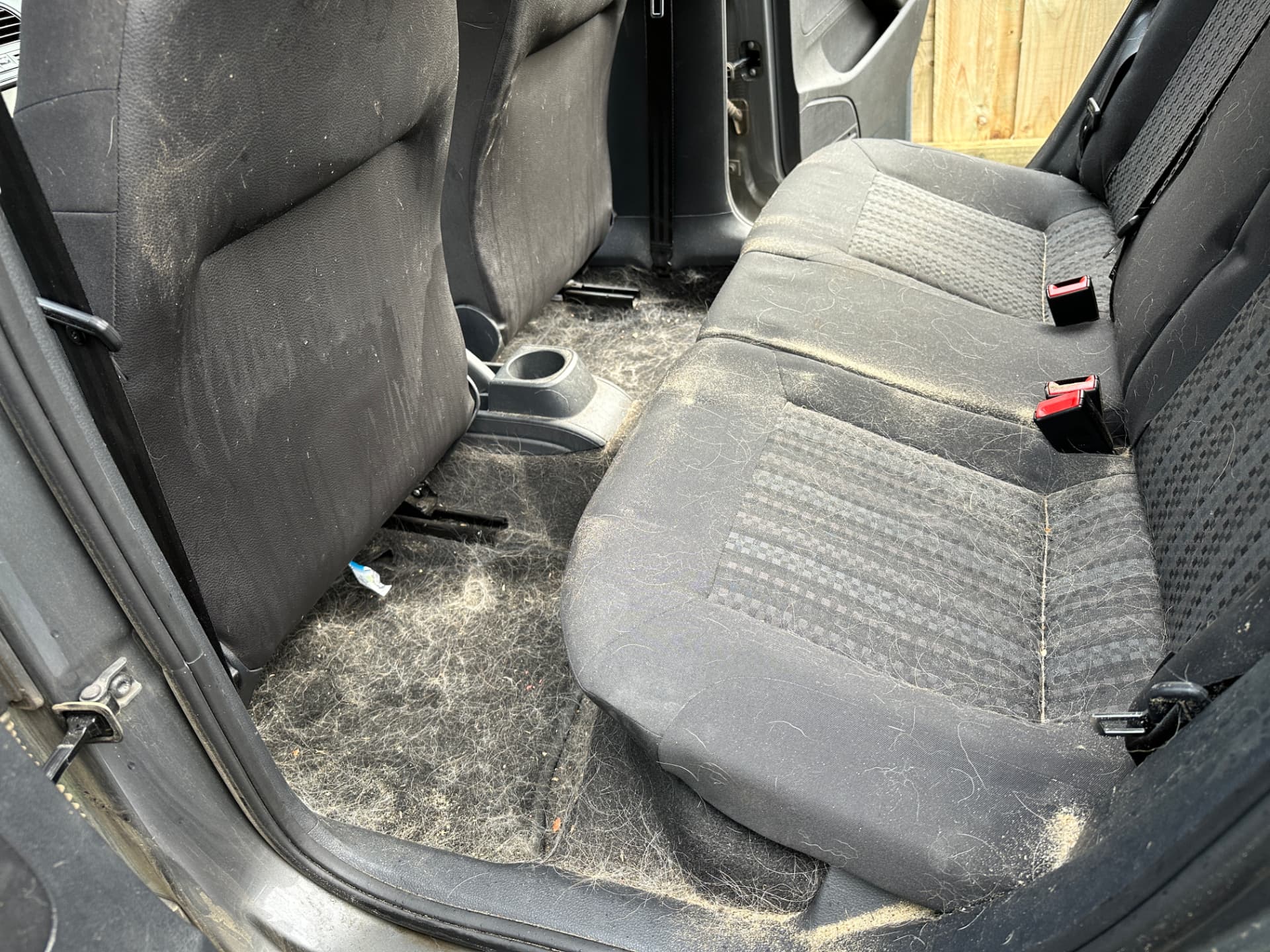 Before — VW Polo rear seats and carpet before and after a pet hair removal and interior detail