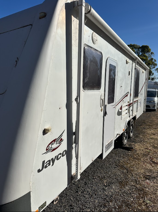 Before — Jayco caravan side wall before and after a wash, polish and protection