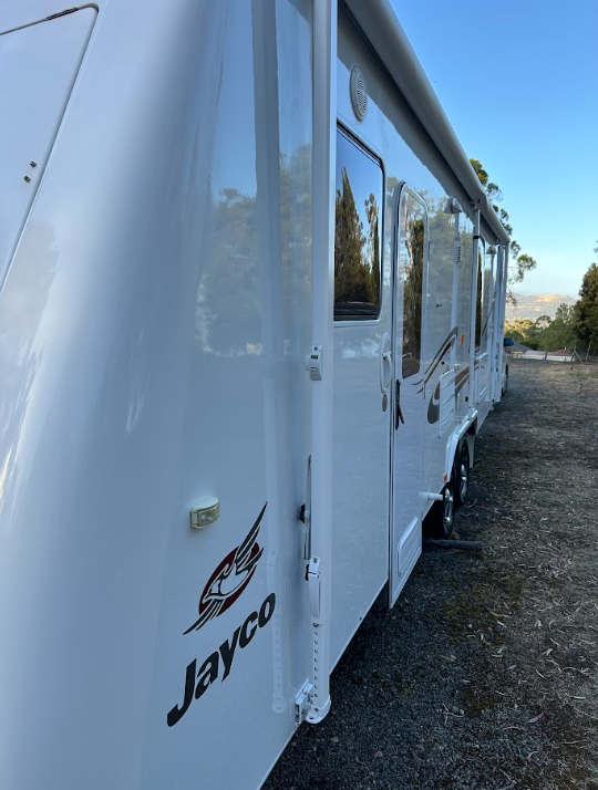 After — Jayco caravan side wall before and after a wash, polish and protection